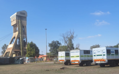 Police trucks at the mine in Orkney. eNCA/Bafedile Moerane