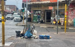 Garbage on a pavement in Johannesburg. eNCA/Heidi Giokos