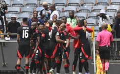 Deano van Rooyen of Orlando Pirates celebrates a goal with his teammates. BackpagePix/Sydney Mahlangu