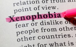 File: The word xenophobia, including key descriptive words. GettyImages/Devonyu