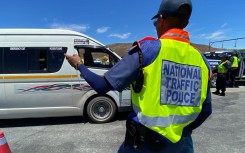 A traffic officer at a roadblock. eNCA/Kevin Brandt