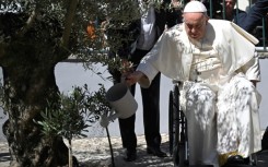 Before leaving the pope watered an olive tree, the symbol of peace, in the patio of the foundation