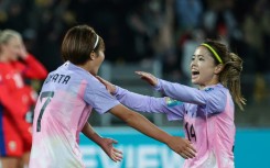 Hinata Miyazawa (L) celebrates scoring Japan's third goal against Norway with Yui Hasegawa (R) at the Women's World Cup