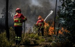 Over 1,000 firefighters battled a fire in central Portugal as officials warned thousands of hectares were at risk