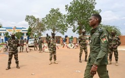 West African nations on Friday suspended a key military meeting on the crisis in Niger