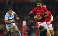 Taulupe Faletau (right) in action for Wales