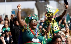 A Springboks supporter bids farewell to the Rugby World Cup squad at a Johannesburg airport before they left for London on August 12, 2023.  