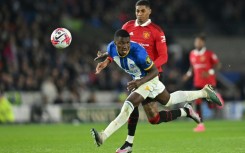 Ecuadorian midfielder Moises Caicedo (left)has joined Chelsea for a reported British record £115 million transfer fee