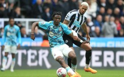 Chelsea signing - Belgian midfielder Romeo Lavia (L) in action for Southampton