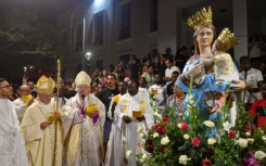 Each year the Virgin Mary figurine has been carried slightly farther from Tunisia's oldest church during the Feast of the Assumption procession