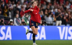 Olga Carmona celebrates scoring for Spain