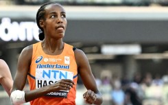 Sifan Hassan shrugged off her fall in the 10,000m final to reach the 1500m world final