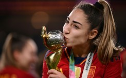 Spain captain and goalscorer Olga Carmona kisses the World Cup