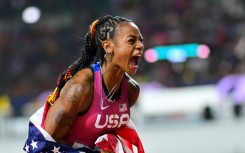 USA's Sha'Carri Richardson screams in joy after winning the women's world 100m gold