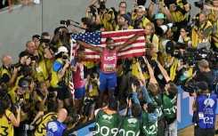 USA's Noah Lyles (R) and USA's 200m silver medallist Erriyon Knighton