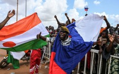 Protesters supporting the military leaders behind last months' coup gathered outside the French airbase in Niger 