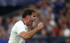 Try scorer Damian Penaud roars with delight after France beat the All Blacks