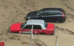 Heavy rainfall causes widespread flooding, cars submerged