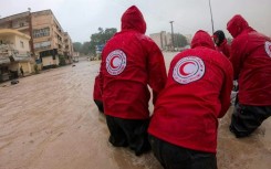 Libyan Red Crescent rescuers in the flood-hit town of al-Bayda 