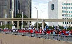 Members of the United Auto Workers (UAW) union march through the streets of downtown Detroit following a rally on the first day of the UAW strike in Detroit, Michigan, on September 15, 2023