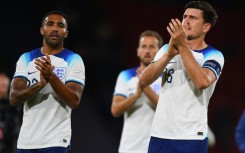 Harry Maguire (right) applauds the fans after England's 3-1 win against Scotland in Glasgow