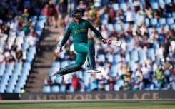 Heinrich Klaasen celebrates after reaching his rapid century during the fourth ODI for South Africa against Australia in Centurion