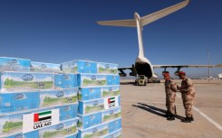 Aid supplied by the United Arab Emirates for survivors of floods that submerged Libya's eastern city of Derna arrives in Benghazi