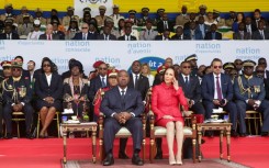 Gabon's ousted president Ali Bongo Ondimba, who ruled the oil-rich country for 14 years, and his wife Sylvia Bongo at a parade to mark independence day in 2019