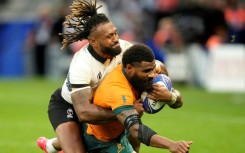 Fiji captain Waisea Nayacalevu tackles 
Australia's Marika Koroibete in Fiji's stunning victory over the Wallabies at the World Cup