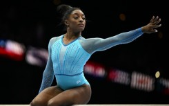 Back on the big stage: Simone Biles competes during the women's qualifying session on Sunday