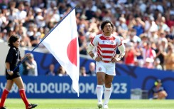 Japan's loosehead prop Keita Inagaki (R)