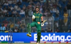 South Africa's Aiden Markram celebrates after scoring the fastest World Cup century