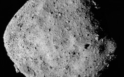 A sample from the asteroid Bennu is being painstakingly analyzed in a white room at NASA's Johnson Space Center in Houston 
