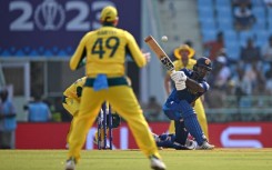 In the runs: Sri Lanka's Kusal Perera plays a shot against Australia at the Ekana Cricket Stadium in Lucknow on Monday 