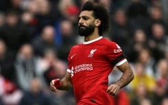 Mohamed Salah reacts after scoring his second goal for Liverpool in a Merseyside derby victory over Everton
