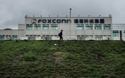 Taiwan defended tech giant Foxconn after China launched an investigation into several of the firm's sites