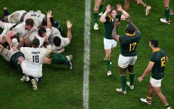 Faf de Klerk and Ox Nche celebrate the late scrum penalty