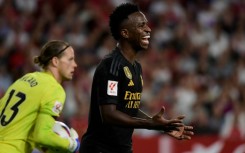 A Sevilla fan was expelled during the 1-1 draw with Real Madrid on Saturday and Los Blancos forward Vinicius Junior (R) says a child also made a racist gesture