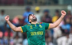 Tailend stars: South Africa's Tabraiz Shamsi (left) and Keshav Maharaj celebrate the one-wicket win