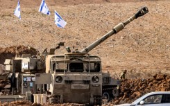 An Israeli self-propelled howitzer along the border with Gaza near Sderot in southern Israel