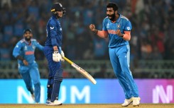 That's out: India's Jasprit Bumrah celebrates after taking the wicket of England's Joe Root 