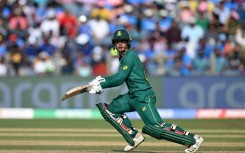 Century makers: South Africa's Quinton de Kock (left) celebrates with teammate Rassie van der Dussen 