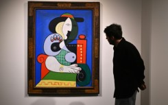 Pablo Picasso's painting 'Femme a la montre,' or 'Woman with a Watch' is viewed during Sotheby’s fall preview in New York on November 2, 2023 