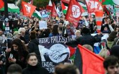 The left-wing organisers of the protest called for France to 'demand an immediate ceasfire' between Israel and Hamas militants