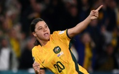 Sam Kerr celebrates scoring against England in the World Cup semi-finals