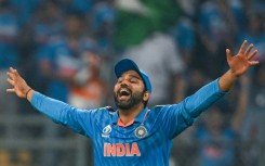 Captain courageous: India skipper Rohit Sharma celebrates his side's World Cup semi-final win over New Zealand