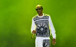 Snoop Dogg, shown here performing in a 50th anniversary hip-hop concert in the Bronx, has said he's giving up "the smoke"