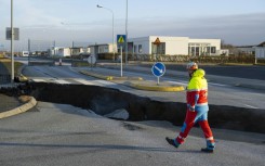 A gaping crevice in a main road of Grindavik, southwestern Iceland, caused by a series of recent earthquakes