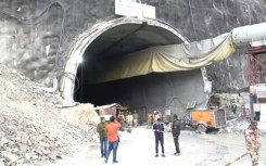 Indian rescuers battle for third day to free 40 trapped tunnel workers