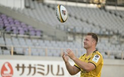 "A lot of the areas that I want to get better at in my game -- speed, agility -- are all required in this league," Sam Cane as he donned his new kit for Tokyo Sungoliath